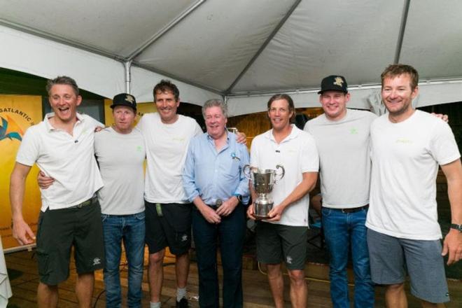 RORC Admiral, Andrew McIrvine presented Brian Thompson and Phaedo3 crew with the Multihull Class Trophy on Lloyd Thornburg’s MOD70 - RORC Transatlantic Race © RORC/Arthur Daniel